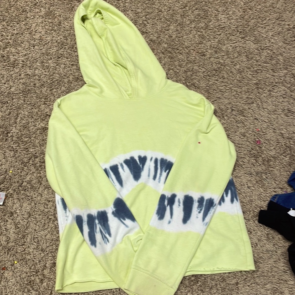 One small pink stain on the sleeve